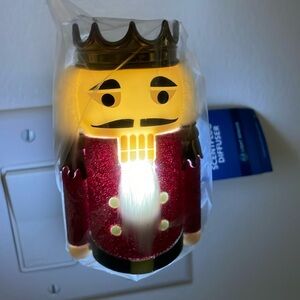 Yankee Candle Scentplug diffuser w/ light sensor Christmas nutcracker mat